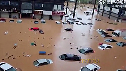 Тайфун "Канун" затапливает Пекин