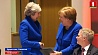 Синие жакеты Терезы Мэй и Ангелы Меркель говорят о мудрости, надежности и рассудительности