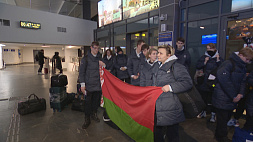 В Национальном аэропорту Минск с победными эмоциями встречали особую команду