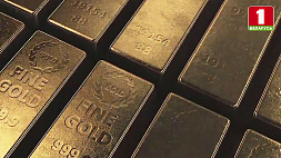 Мировые цены на золото выросли из-за снижения доверия к доллару