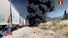 В Мексике бензовоз врезался в грузовой поезд и взорвался