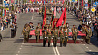 В Могилеве день 9 Мая начался с торжественного шествия, а в Гомеле можно увидеть настоящую военную технику