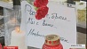 Свечи и цветы, чтобы почтить память жертв авиакатастрофы