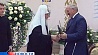 Александр Лукашенко прикоснулся ко кресту Андрея Первозванного