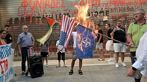 Протестующие в Греции сожгли флаги США и НАТО 