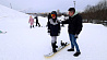 Спуск по крутым склонам - попробовать почувствовать себя профессиональным  лыжником или сноубордистом  можно в горнолыжном Минске
