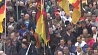 Сотни демонстрантов оказали холодный прием канцлеру Германии в Дрездене